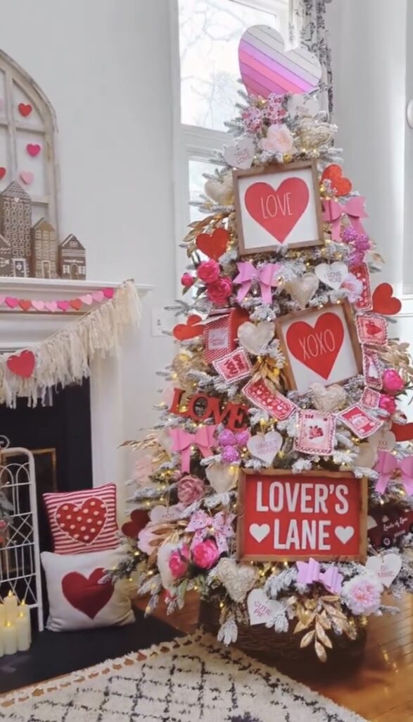 Lovers Lane Valentines Day tree with blush accents, hearts, and soft ribbon in a cottage style room, credit corbelcottage.