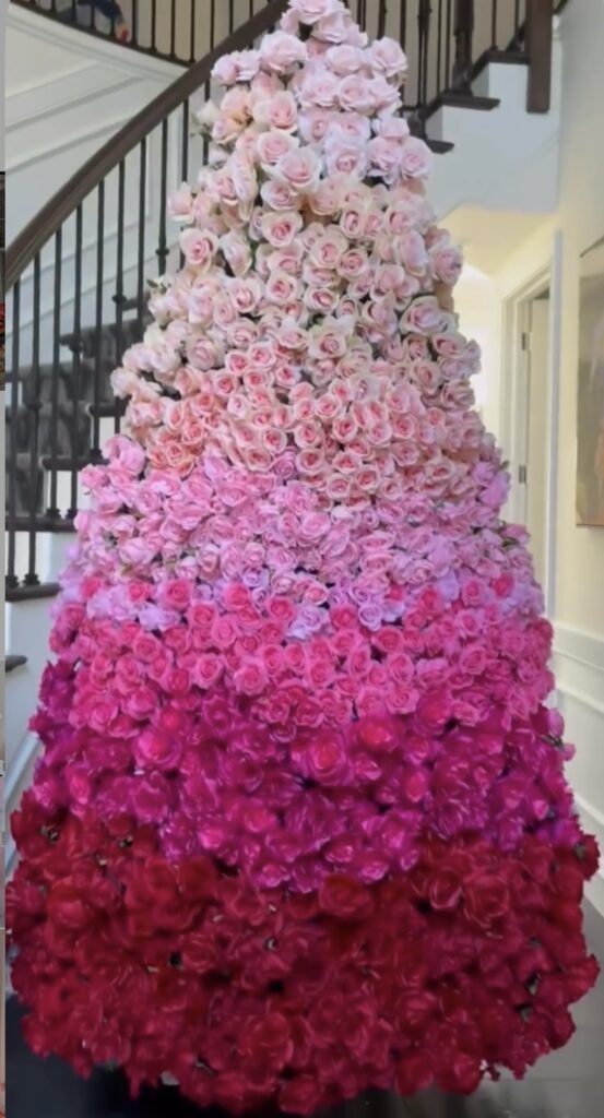 Valentines Day tree decorated with flowers in a ombre style beside a staircase, credit sami_riccioli.