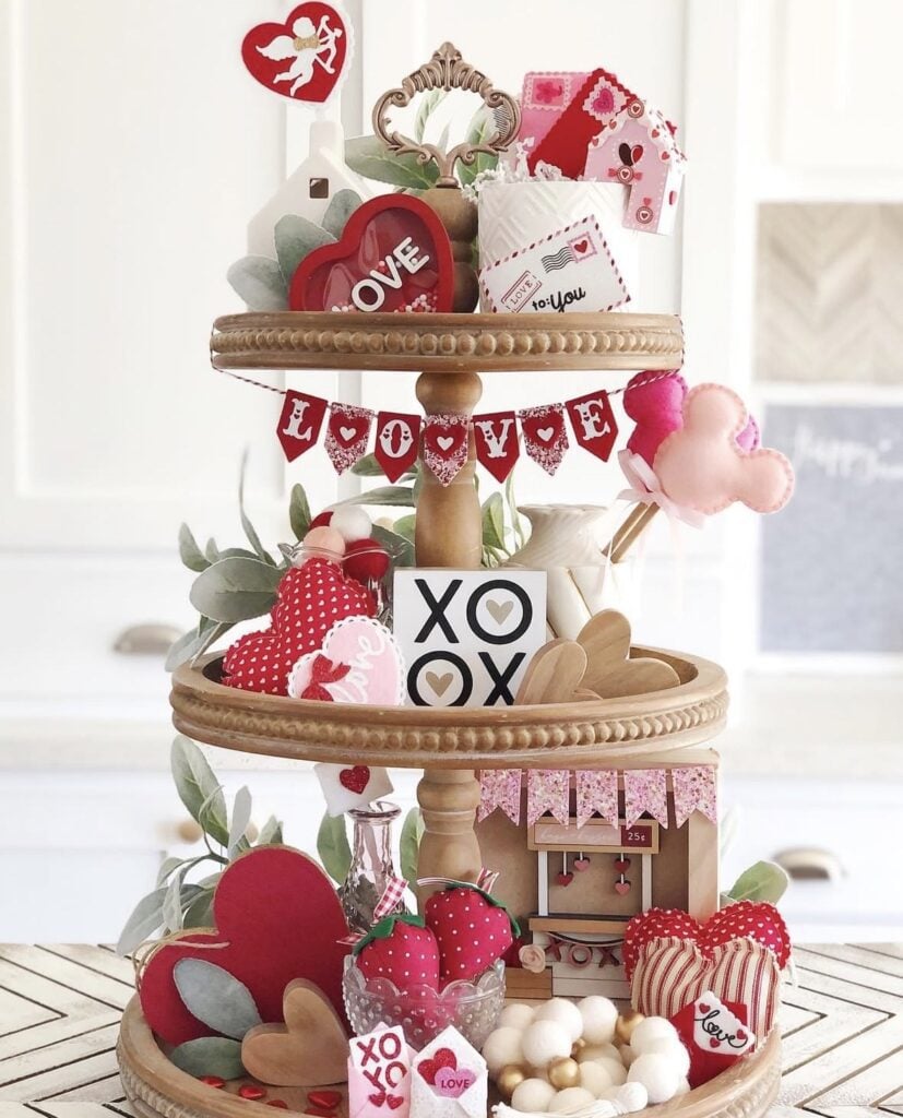 Valentines tiered tray in red and white and pink with xoxo sign and love banner