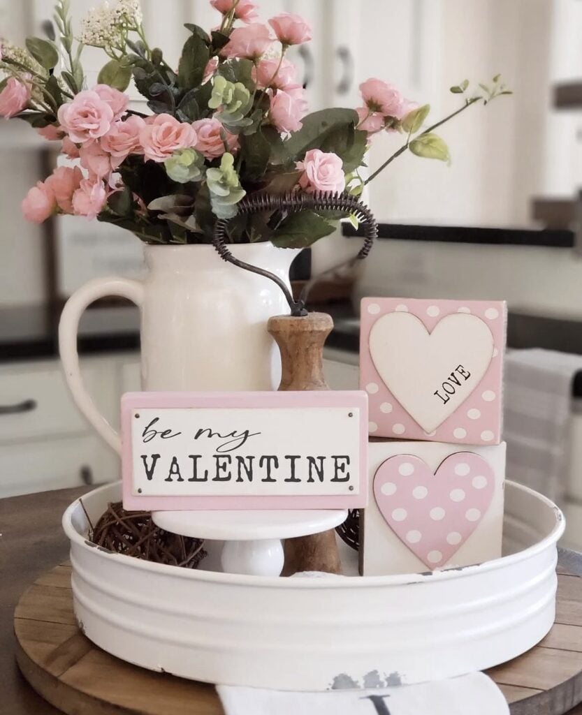 Valentines tray in blush pink and white in a kitchen with be my valentine sign, pitcher of flowers and polka dot heart