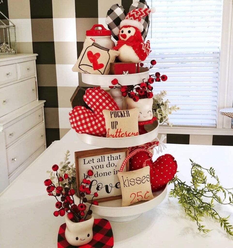 Valentines tiered tray in red and white with black and white checks in background