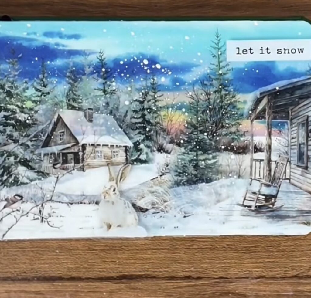 Cozy winter scrapbook spread with layered papers, labels, and outdoor winter motifs with bunny rabbit in snowy neighborhood