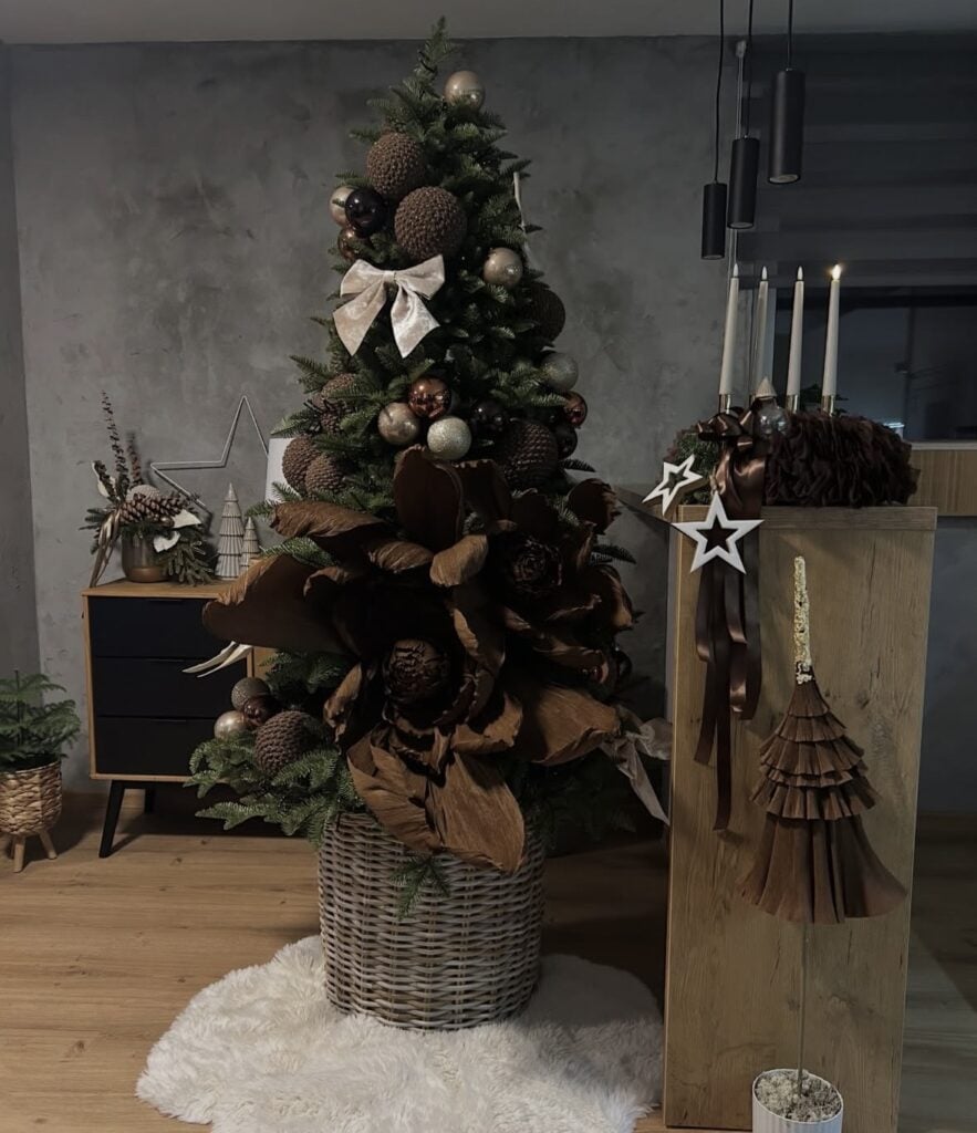 Brown Christmas tree decorated with warm neutral ornaments, soft ribbon, and cozy festive details