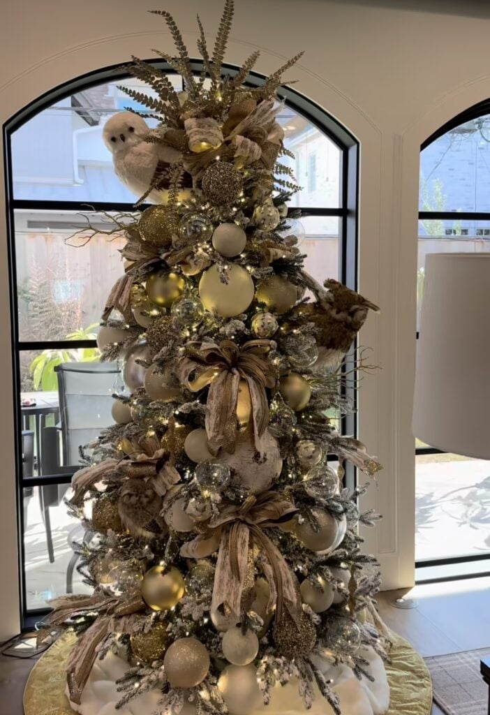 Brown Christmas tree with woodland-inspired ornaments, warm neutral decor, and earthy holiday styling