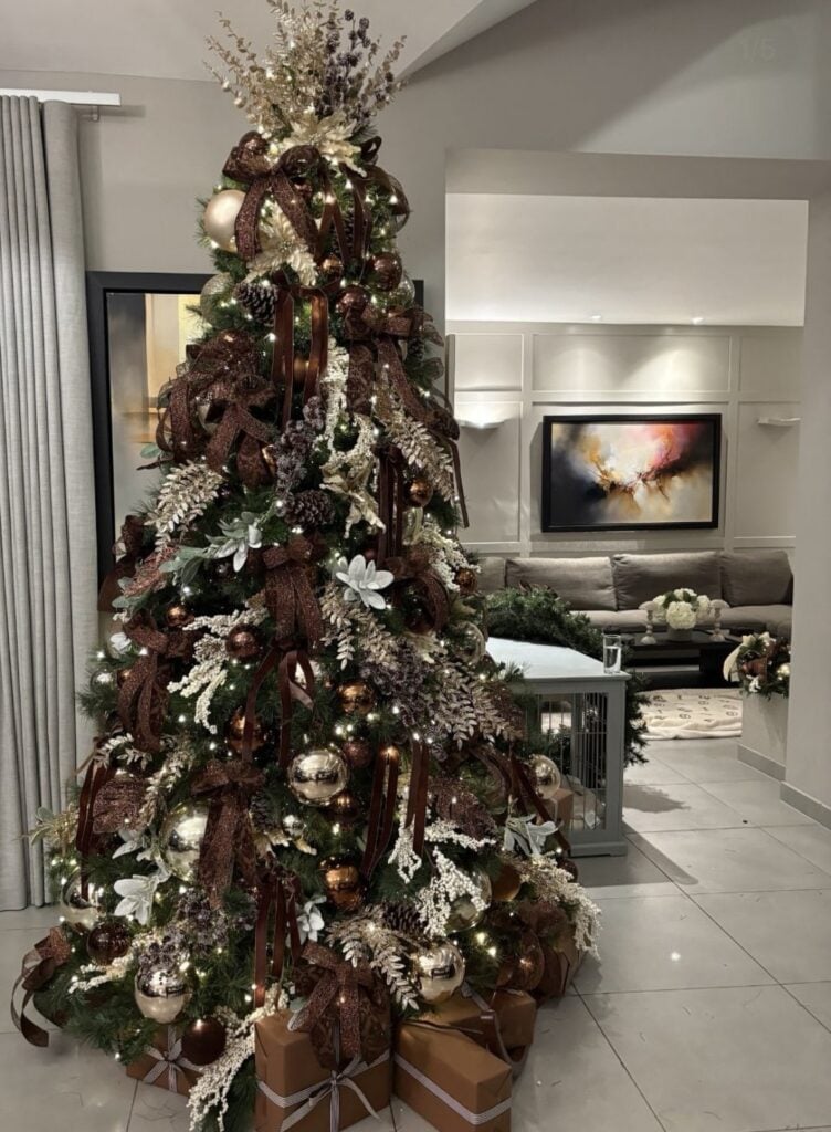 Styled brown Christmas tree with gold accents