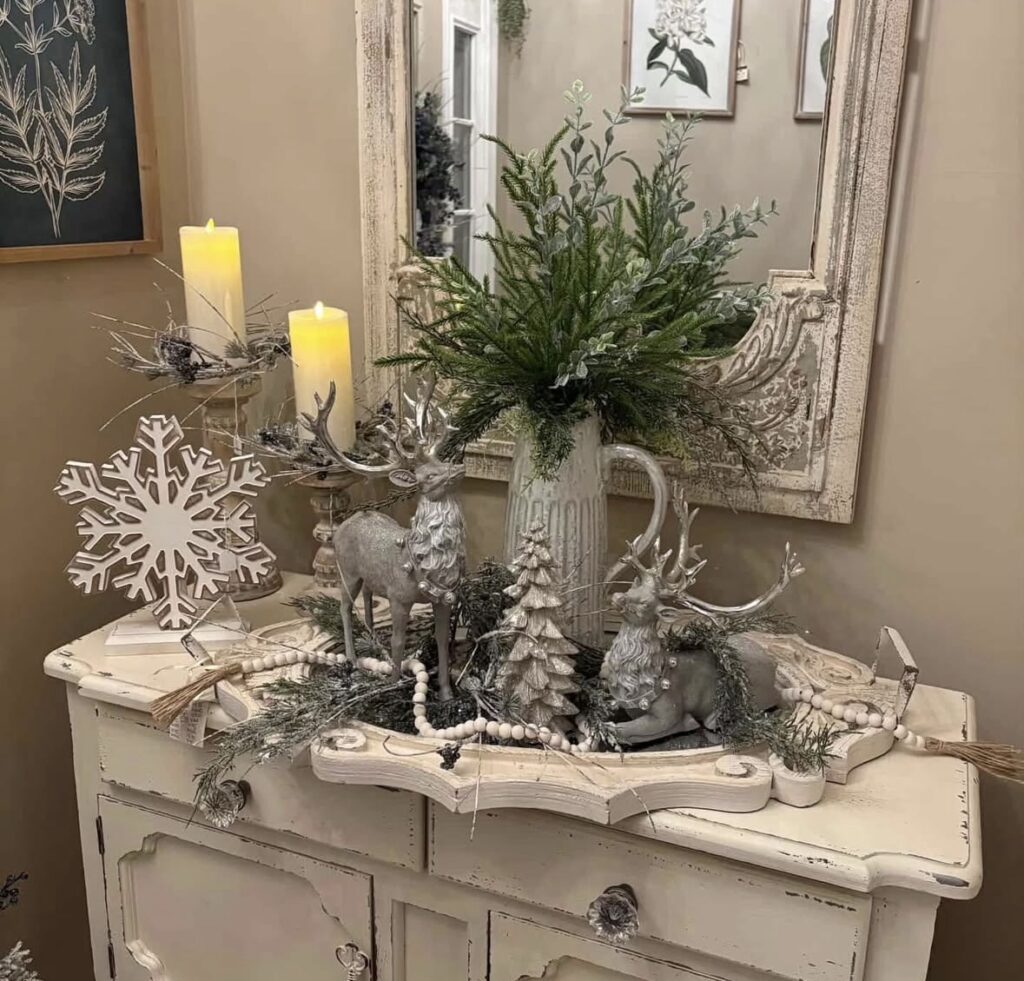 Neutral Christmas side table decorated with simple seasonal accents for an elegant and cozy holiday display, featured by slowestuff.com.