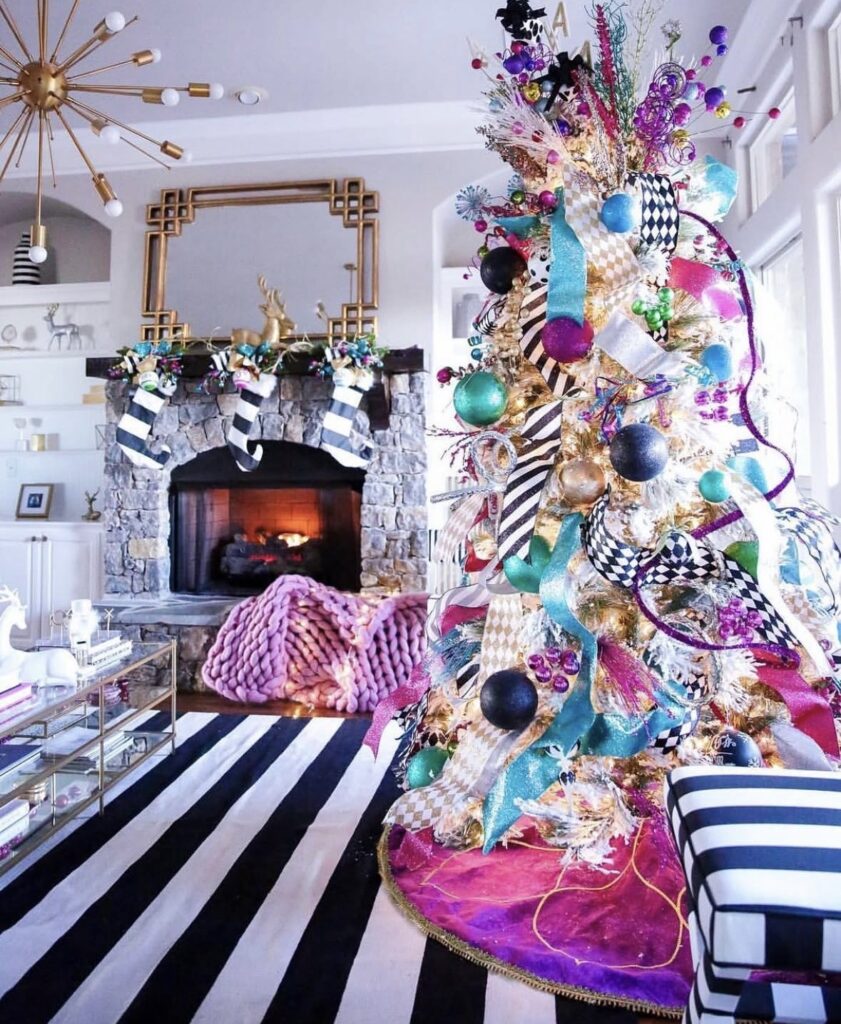 Glam non-traditional Christmas tree with stylish ornaments and festive holiday decor