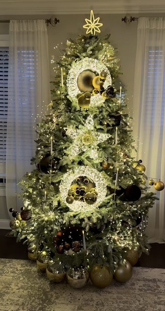 Modern Christmas tree decorated with unexpected ornaments and stylish holiday decor