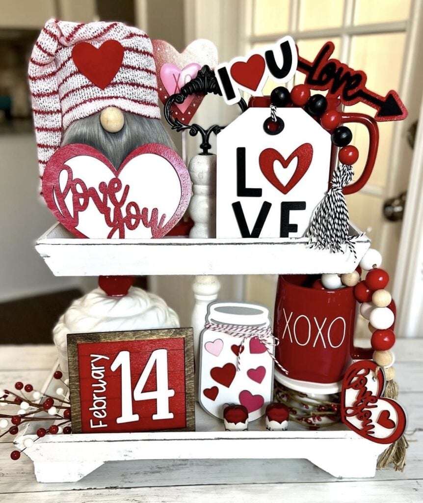 Bold red Valentine tiered tray with gnomes, love signs and feb 14 signs on white tray