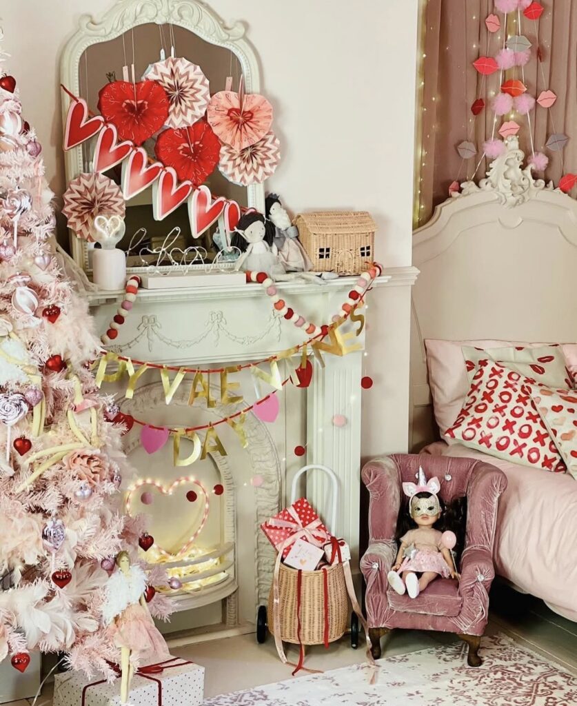 valentines day tree pink with heart decorations in a bedroom with a hearth