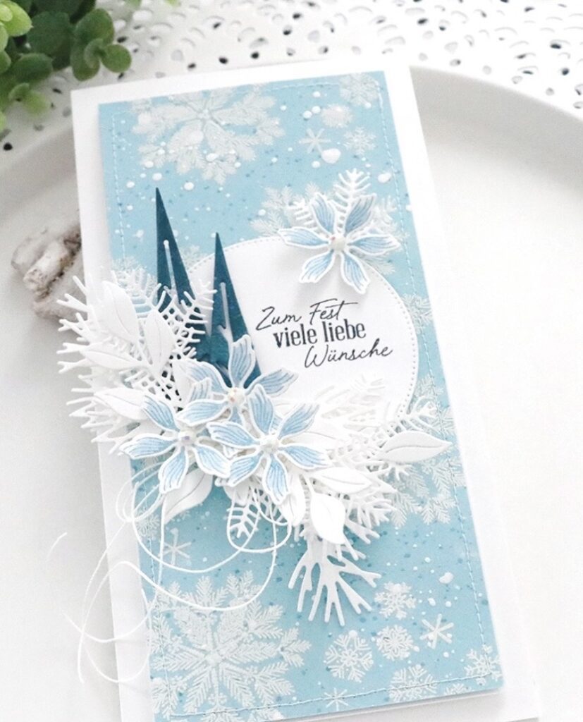 Winter blues scrapbook page with cool tones, layered paper elements, and a cohesive seasonal palette.