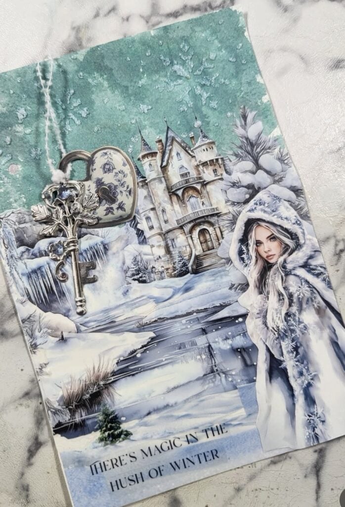 Winter scrapbook page in aqua and icy blue tones with layered pieces and a crisp winter vibe.