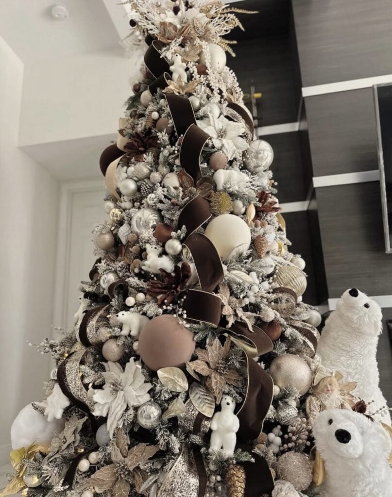 Glam Brown Christmas tree design with rich neutral decorations and elegant layered holiday styling