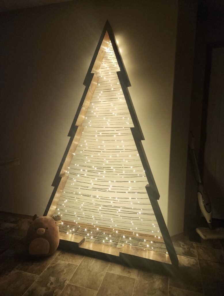Unusual non-traditional Christmas tree idea with a creative holiday display