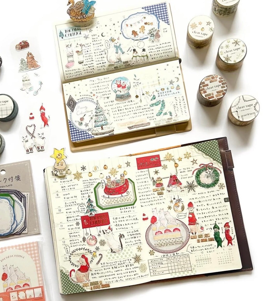 Festive December bullet journal pages with seasonal decorations and handwritten planning.
