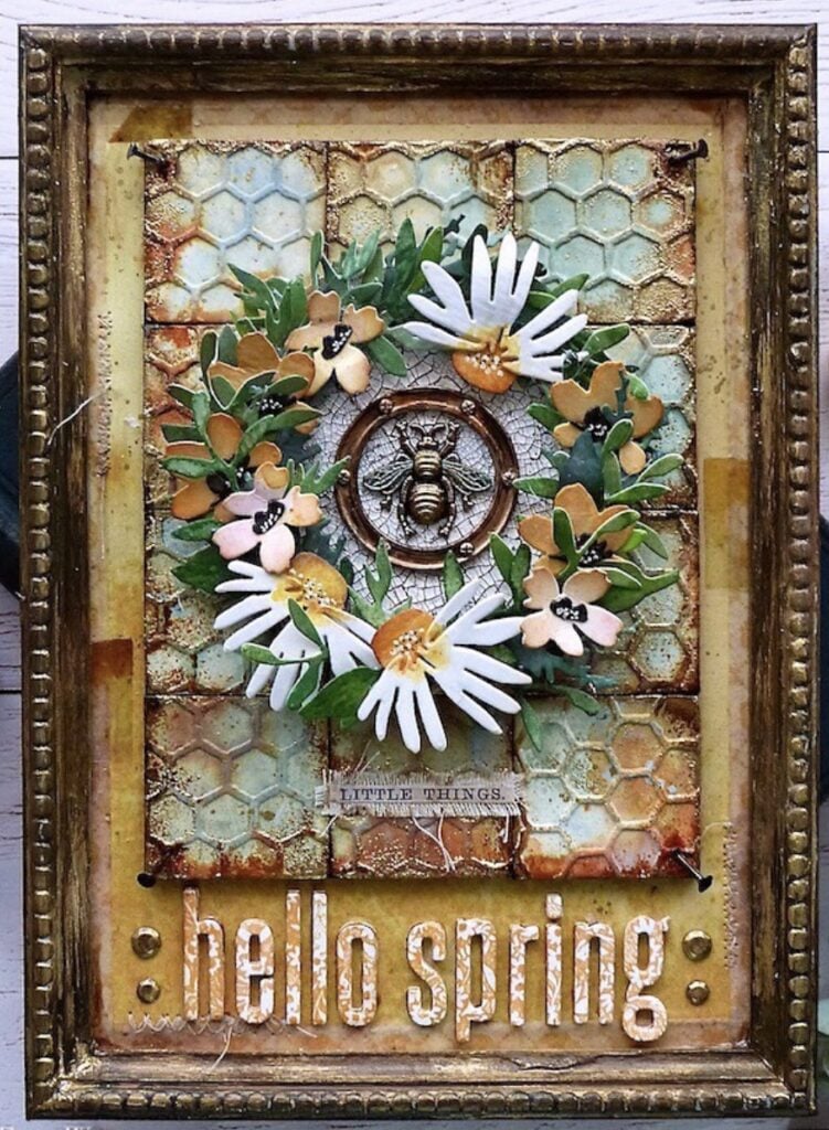 Spring scrapbook layout with layered paper pieces, soft pastel accents, and floral-inspired details.