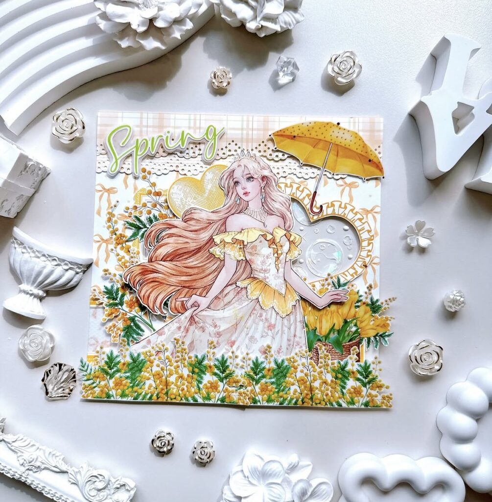 Spring scrapbook page featuring spring theme with girl and umbrella in a field of flowers