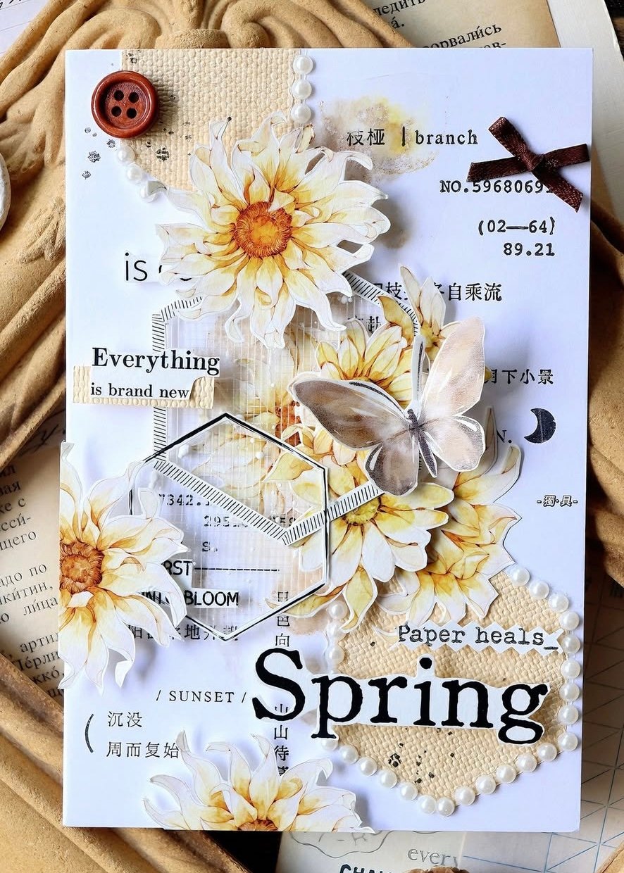 Spring junk journal style page with layered ephemera, soft yellow and white colors, and vintage-inspired spring details.