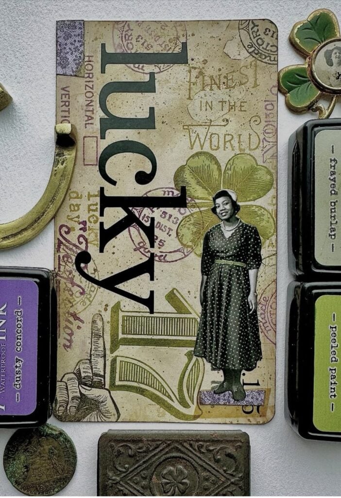 St Patrick's Day junk journal layout with pale green background large word spelling lucky and image of woman in vintage styling