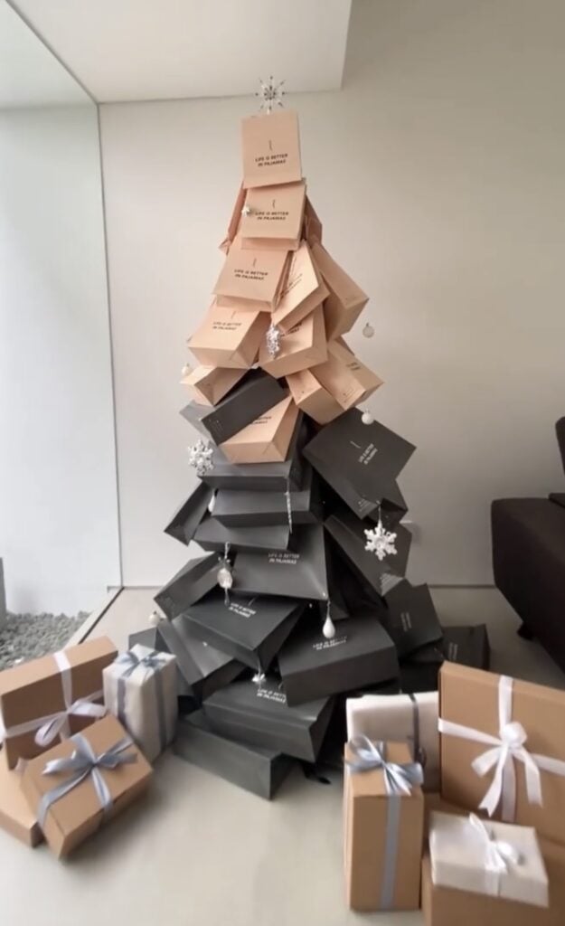 Christmas tree alternative with unique materials arranged in a holiday tree shape