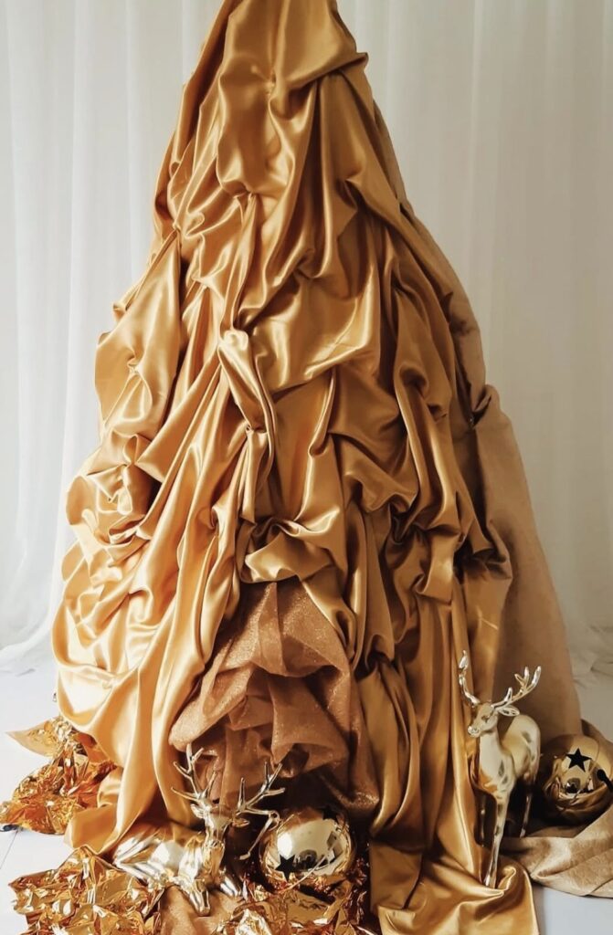 Dramatic event-style Christmas tree alternative with festive holiday decor