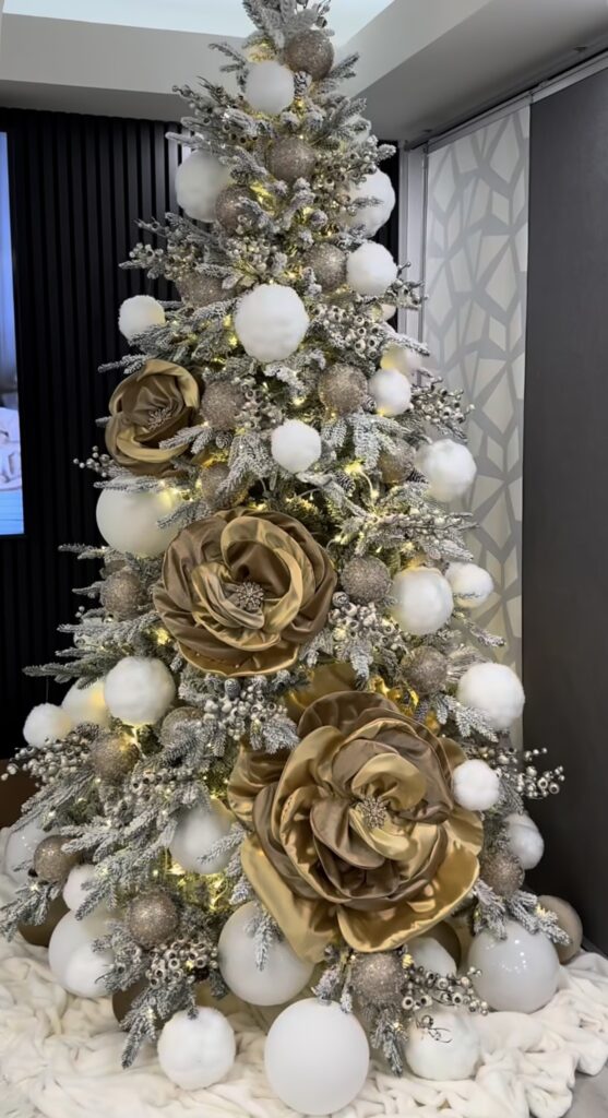 Gold Christmas tree with glamorous ornaments and non-traditional holiday style