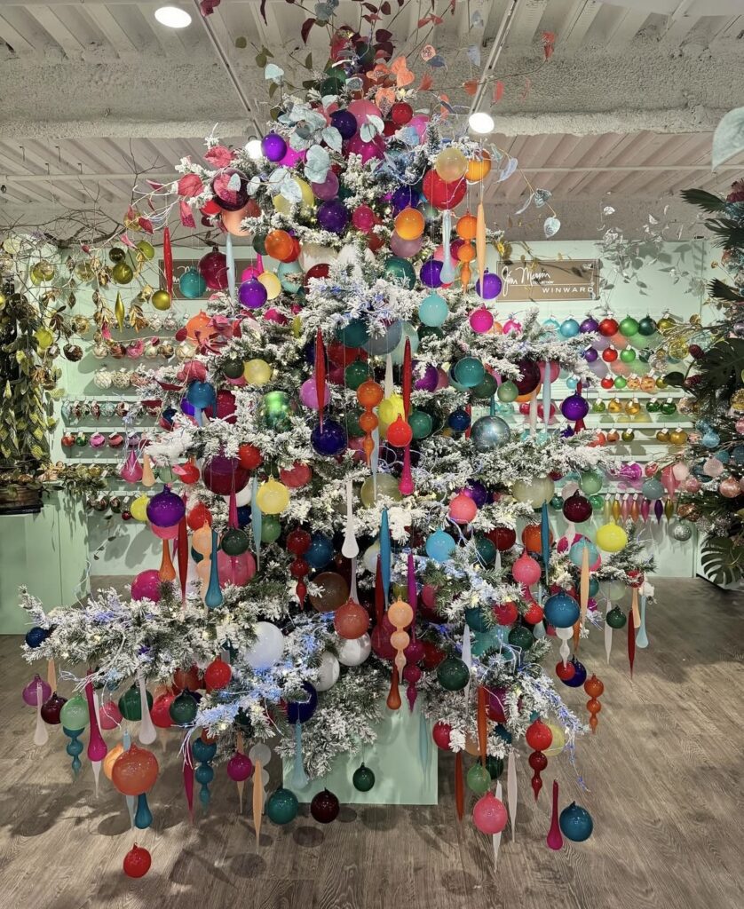Uniquely decorated Christmas tree with festive ornaments and creative holiday style