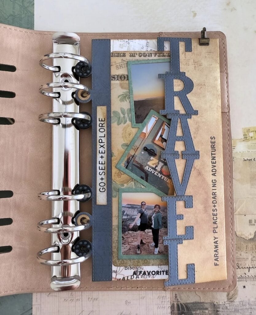Ring binder travel scrapbook cover page with layered photos and big stitched letters spelling “TRAVEL,” plus “Go + See + Explore” text on a vintage paper background.