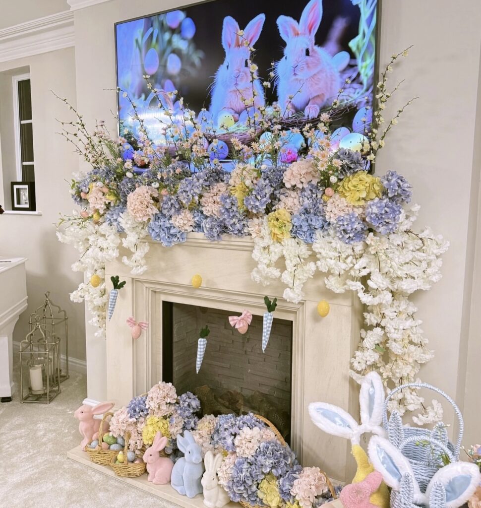 Vintage-inspired Easter mantel decor with cabbage green accents, ceramic rabbits, layered frames, and spring greenery above a white fireplace