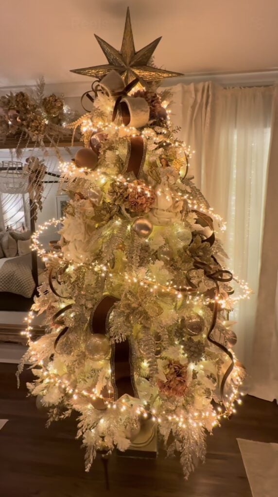 Gold Christmas tree with with a swirl and large bronze star topper