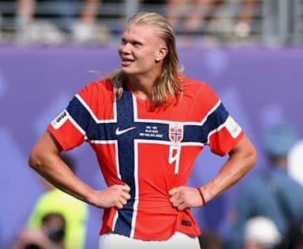 Erling Haaland wearing Norway colors with his long blond hair, inspiration for a viral 2026 Halloween costume.