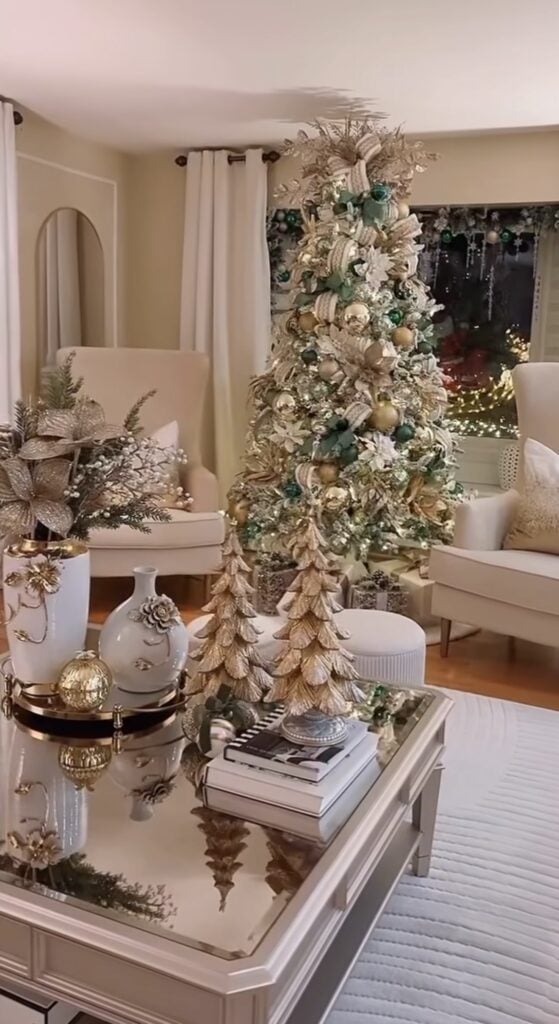 Gold Christmas tree decorated in elegant metallic tones with warm lights and luxurious ornaments.