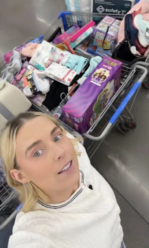 Angel tree shopper with full cart for a creative group Halloween costume.