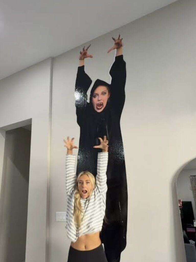 Serena Neel-inspired wall cutouts and colorful decorations for a funny creator-themed Halloween party.
