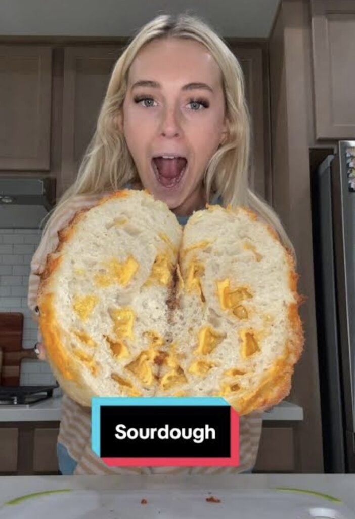 Serena Neel sourdough baker Halloween costume with bread and kitchen accessories.