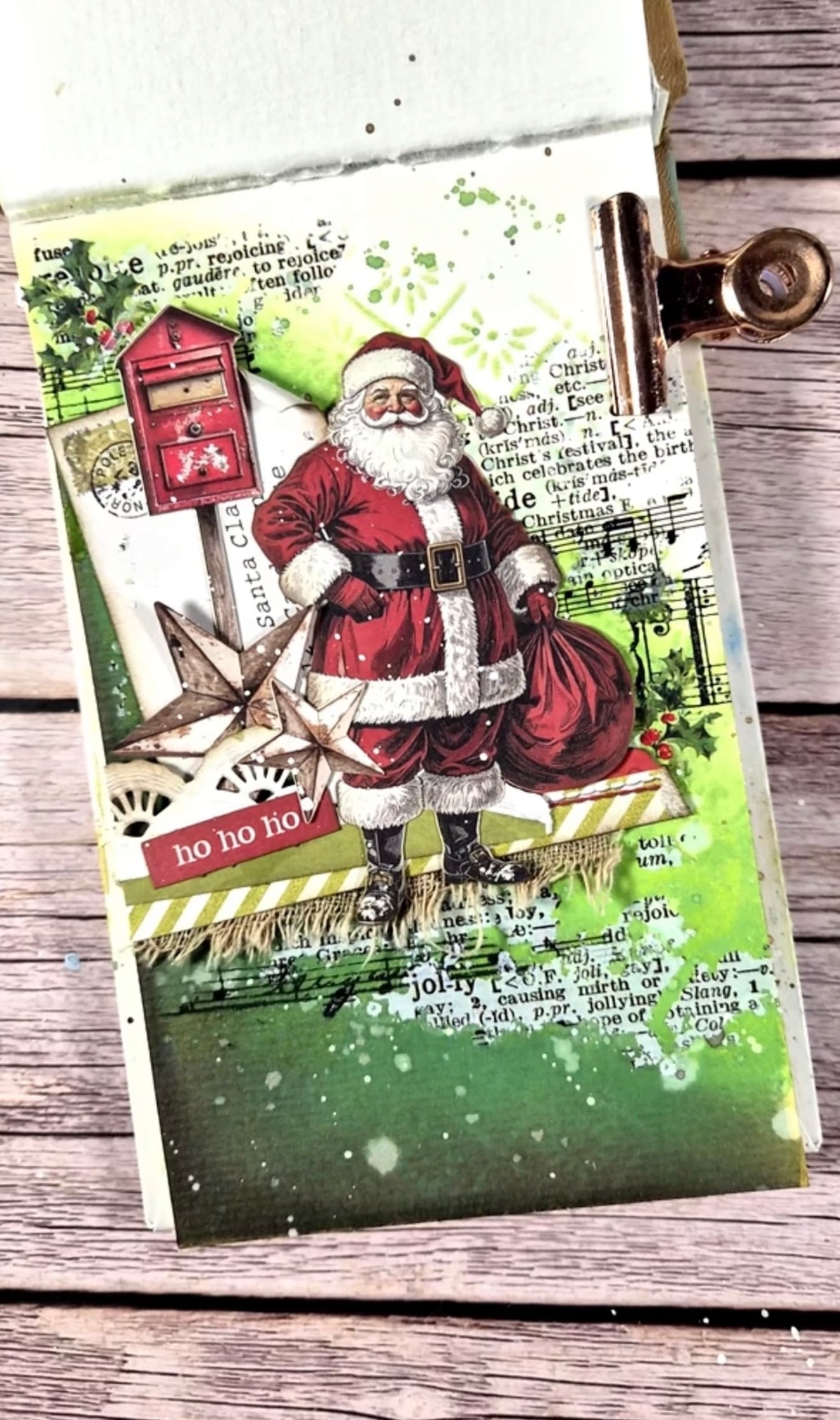Santa junk journal page with bright green background, layered Christmas ephemera and festive embellishments