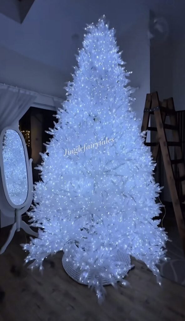 Christmas tree shape created entirely from glowing white lights for a simple, magical, and modern holiday display.