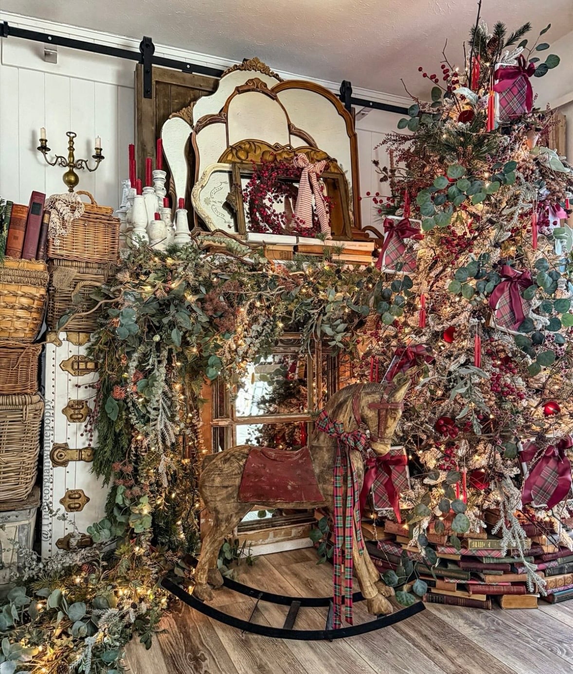 Botanical Christmas fireplace mantel styled with natural branches, greenery, foliage, and organic holiday decorations.
