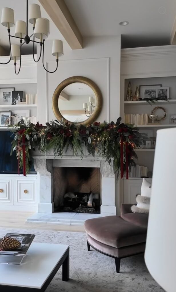 Classic Ralph Lauren Christmas mantel styled with rich greenery, traditional holiday accents, and layered seasonal decor.