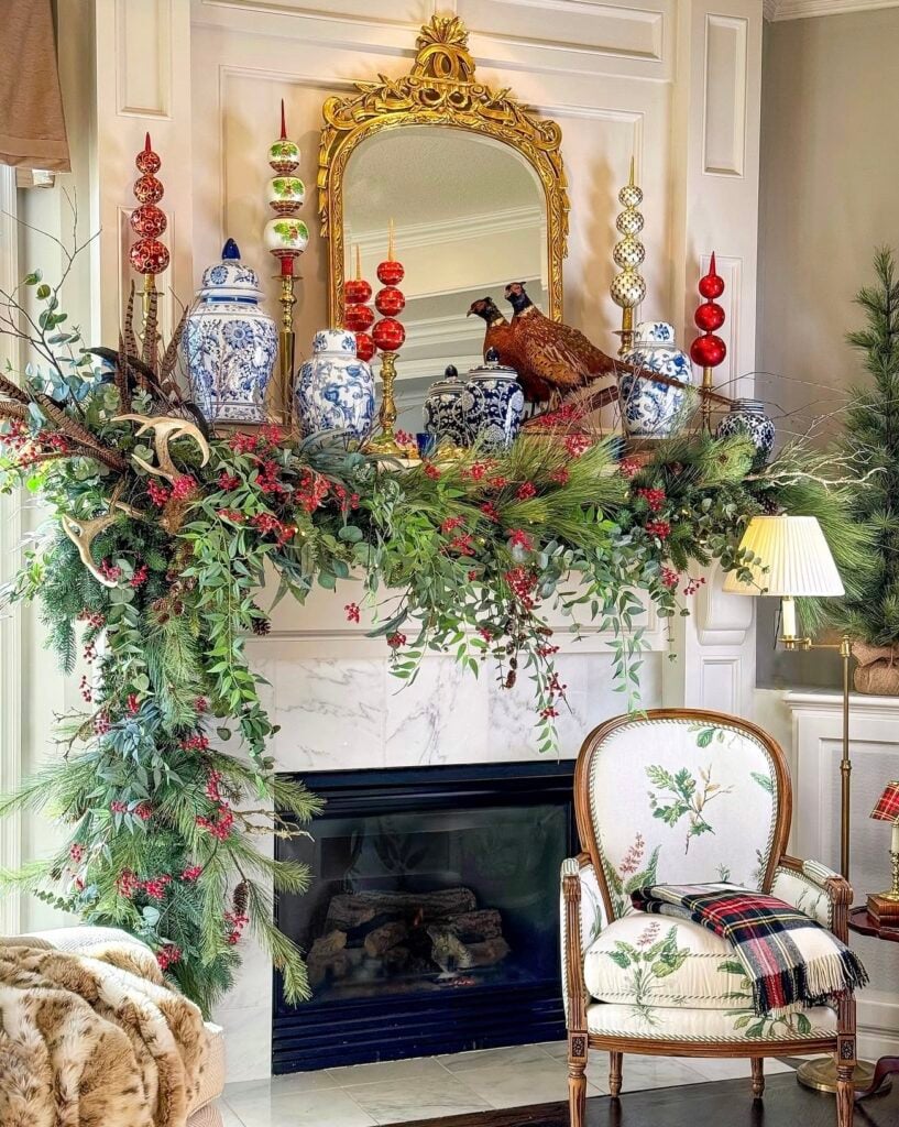 Traditional Ralph Lauren-inspired Christmas mantel with greenery, warm holiday accents, and classic styling and unexpected touches like porcelain dishes and a pheasant