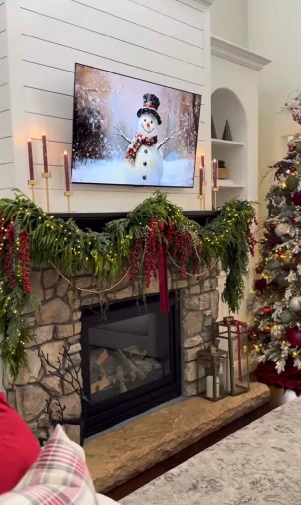 Old money Christmas mantel with rich greenery, classic decor, and polished Ralph Lauren-inspired styling.