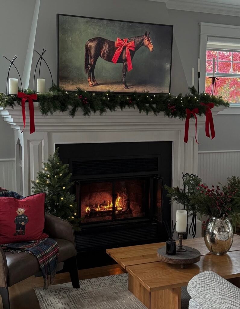 Ralph Lauren-inspired Christmas mantel decor with classic greenery, layered textures, and elegant holiday accents.