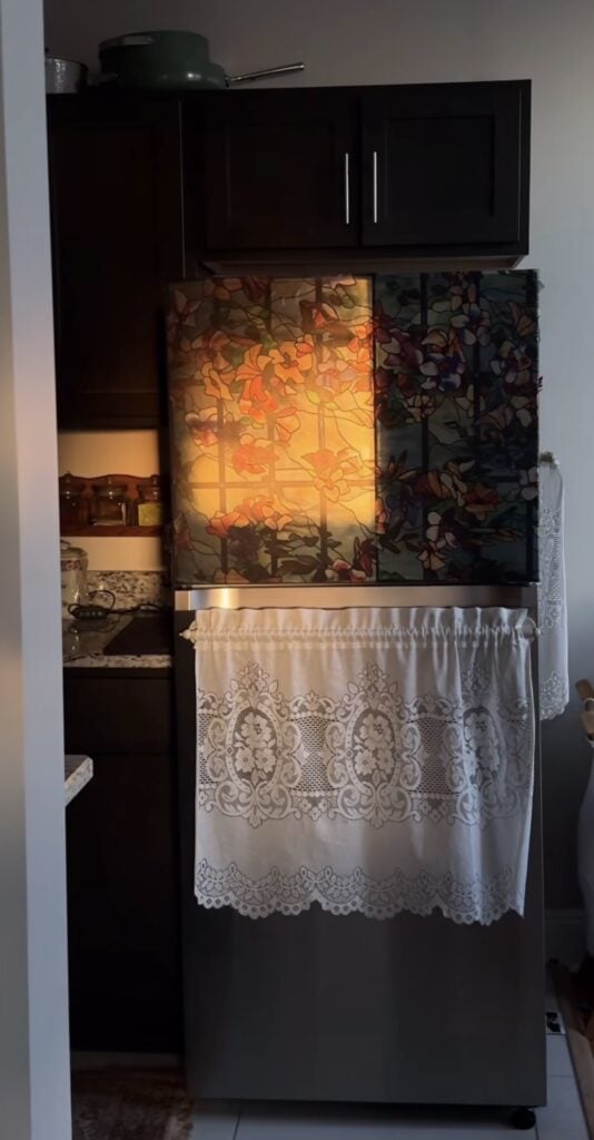 Refrigerator featuring decorative window cling designs that add color without covering the entire appliance.