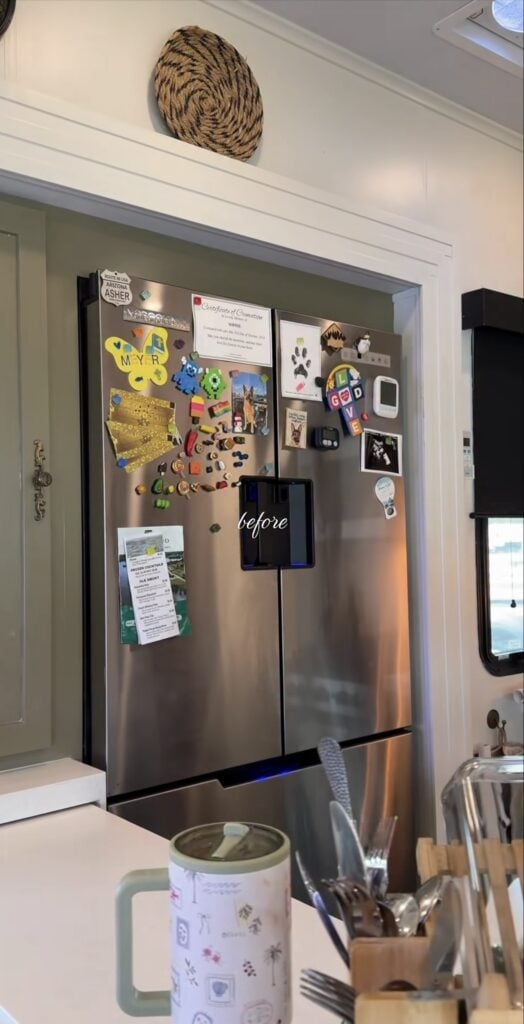 Stainless steel refrigerator before a dramatic wallpaper makeover.