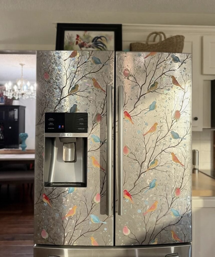 Refrigerator decorated with a patterned window cling as an alternative to full fridge wallpaper.